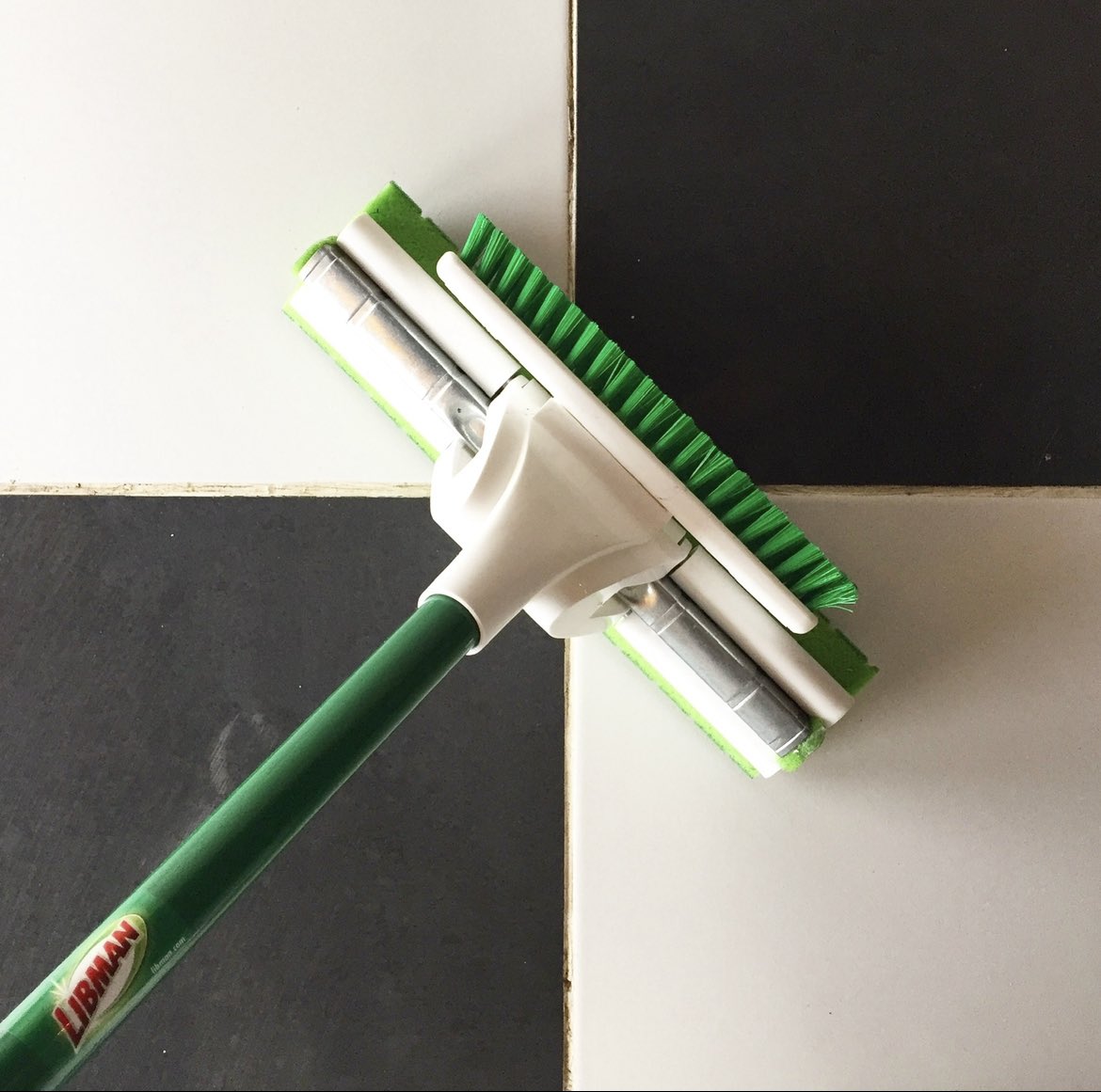 Y/N? A black &amp; white checkerboard floor is a bathroom design classic!
We’re tackling bathrooms around here today and reaching for the Nitty Gritty Roller Mop with its built-in scrub brush for those extra tough spots.
