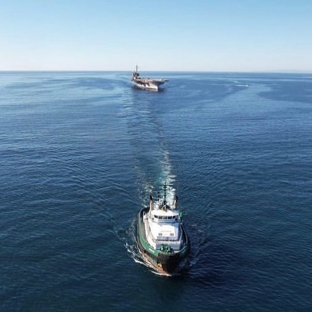 FossMaritime's tweet photo. Capt. Steve Creech and crew on the Michele Foss towing the former USS Kitty Hawk through the Santa Barbara channel. Next stop, Long Beach for refueling.
 📸: Max Tolson, 2nd Mate and Ryan Moore, Chief Mate.
#fossmaritime
#alwayssafe
#alwaysready https://t.co/aCPVGyLjUt
