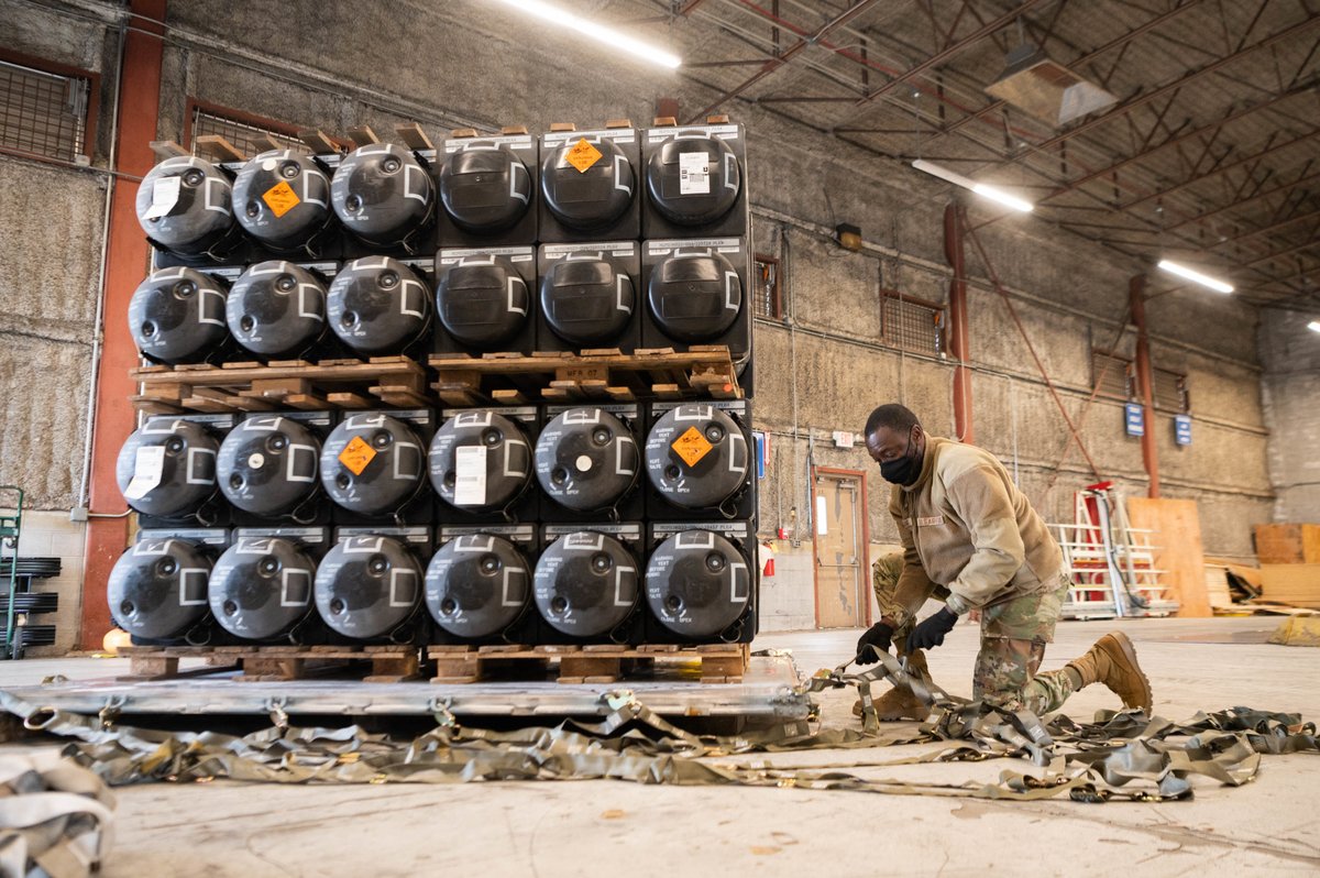 DeptofWar's tweet image. .@usairforce airmen and civilians from the 436th Aerial Port Squadron prepare cargo in support of Ukraine at Dover Air Force Base, Del.
