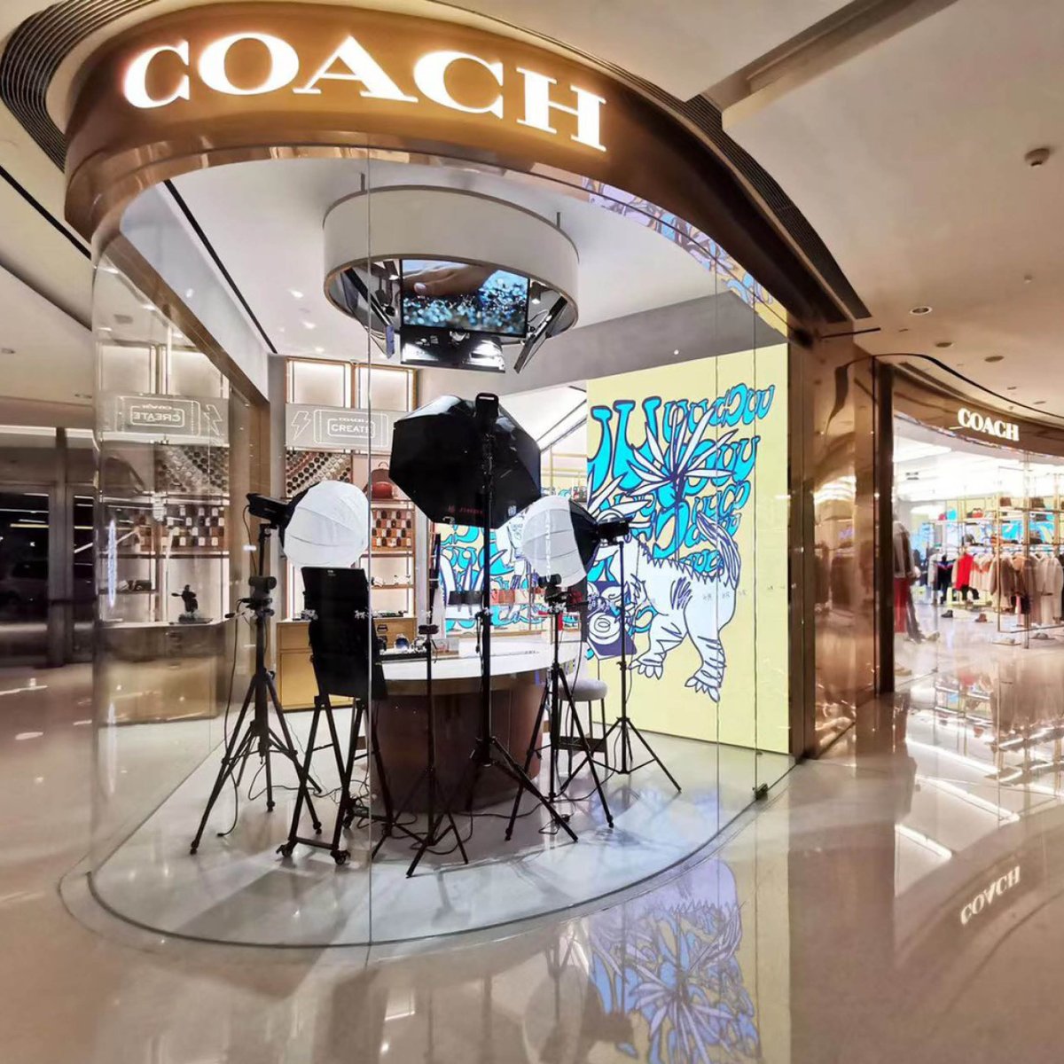 Coach's tweet photo. Shopping with a side of art. 🎨 We collaborated with local illustrator Dandi Gu to create a colorful installation at our store in Shanghai. Swipe right and take a look. (Your admission to this gallery is free.) https://t.co/c3jsdGItbf #CoachNY https://t.co/Xkp6SdpGwl