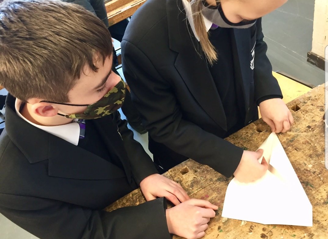 MrsDaviesDT's tweet photo. STEM - Structures and forces.  Year 7 STEM @chepstowschool enjoying the challenge of experimenting with symmetry, weight distribution and balance to create the ideal  paper aeroplane.  #numeracy #design #physics #STEM #DRICE https://t.co/WAEThTetd4