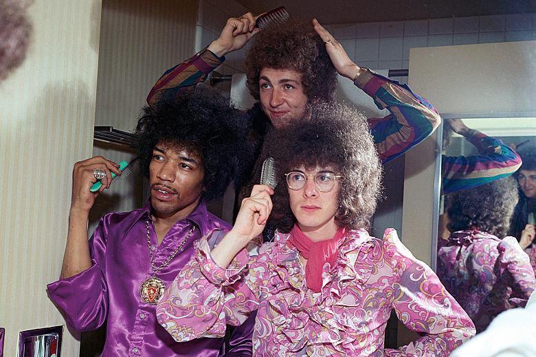 Members of The Jimi Hendrix Experience doing their hair in a mirror  News Photo  Getty Images