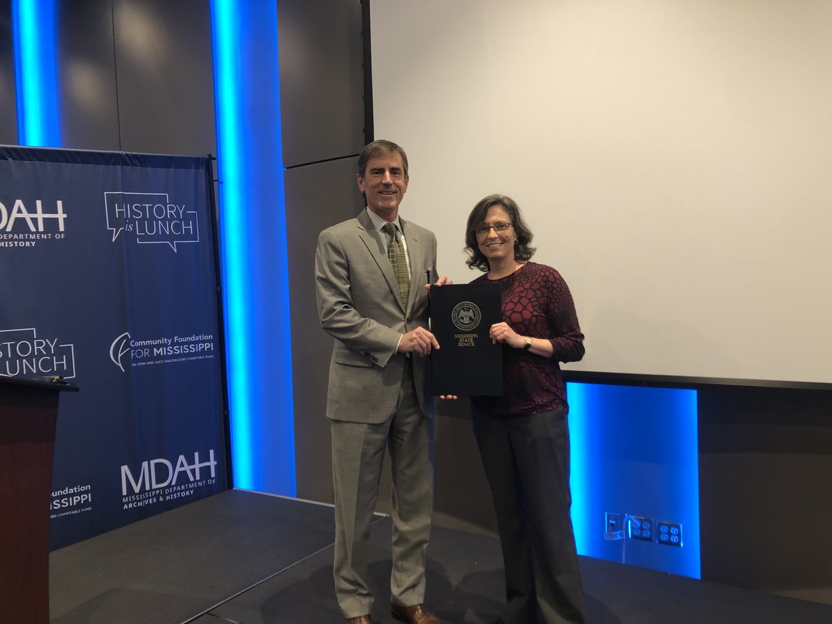MS Depart. of Archives & History (@mdah_official) on Twitter photo Yesterday, during #HistoryIsLunch, Senator <a href="/briggs_hopson/">Briggs Hopson</a> presented Margaret Bucci a proclamation declaring January 12, 2022, Andrew Bucci Day. View the new exhibit Emerging Grace: Andrew Bucci’s Early Works on display at the William F. Winter Archives and History Building. Yesterday, during #HistoryIsLunch, Senator <a href="/briggs_hopson/">Briggs Hopson</a> presented Margaret Bucci a proclamation declaring January 12, 2022, Andrew Bucci Day. View the new exhibit Emerging Grace: Andrew Bucci’s Early Works on display at the William F. Winter Archives and History Building.