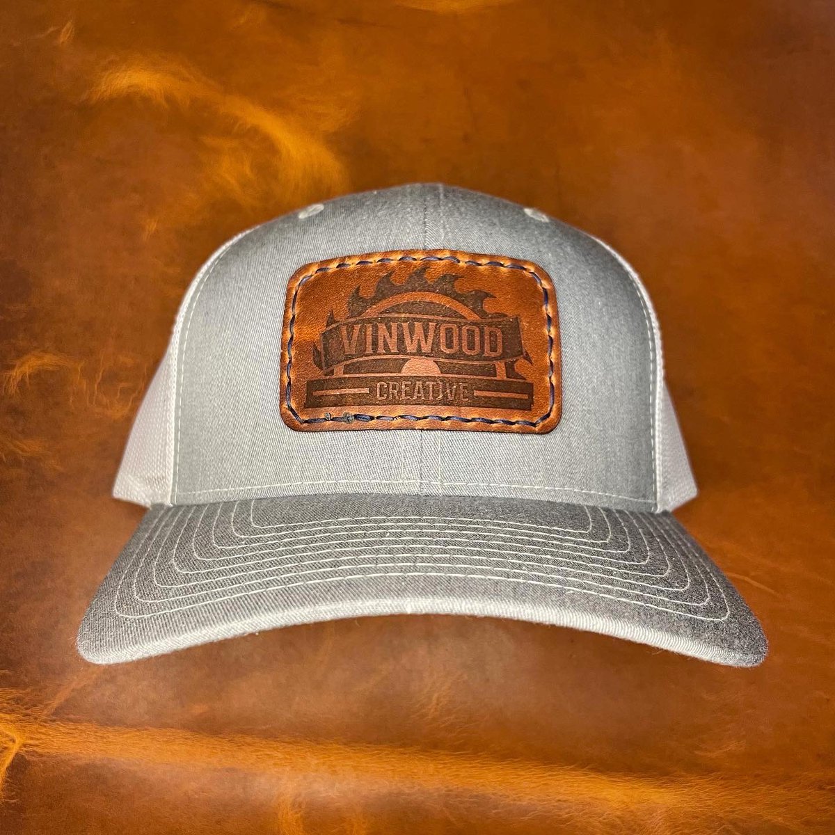 jlo2613's tweet photo. Just a little laser work and saddle stitching to make these hats 🔥. A couple going out to my guy, Mark, over at @Chico_Woodworks https://t.co/jUfX0kGdKA