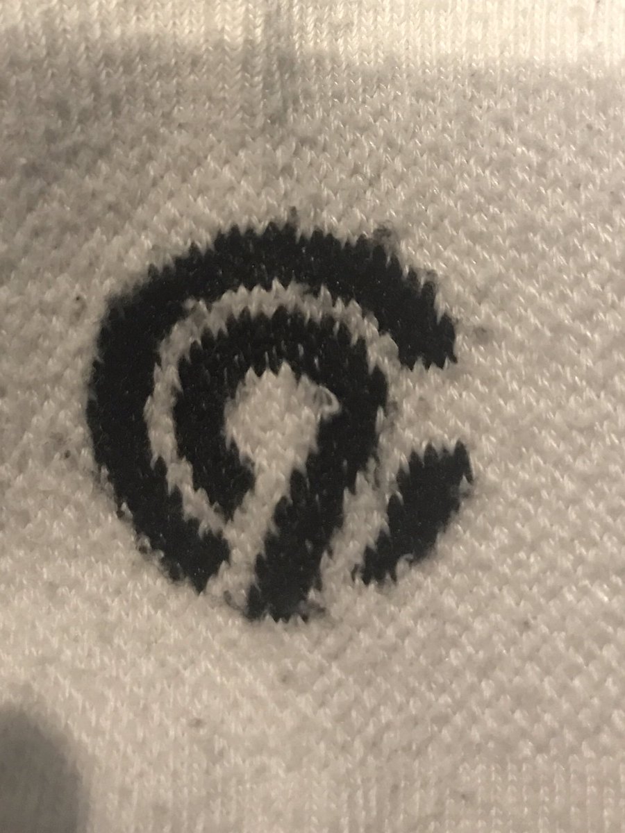 Here’s a strange request that seems perfect for Twitter. My wife loves these socks but doesn’t know the brand. Anyone recognize this logo? (Could be upside down.)