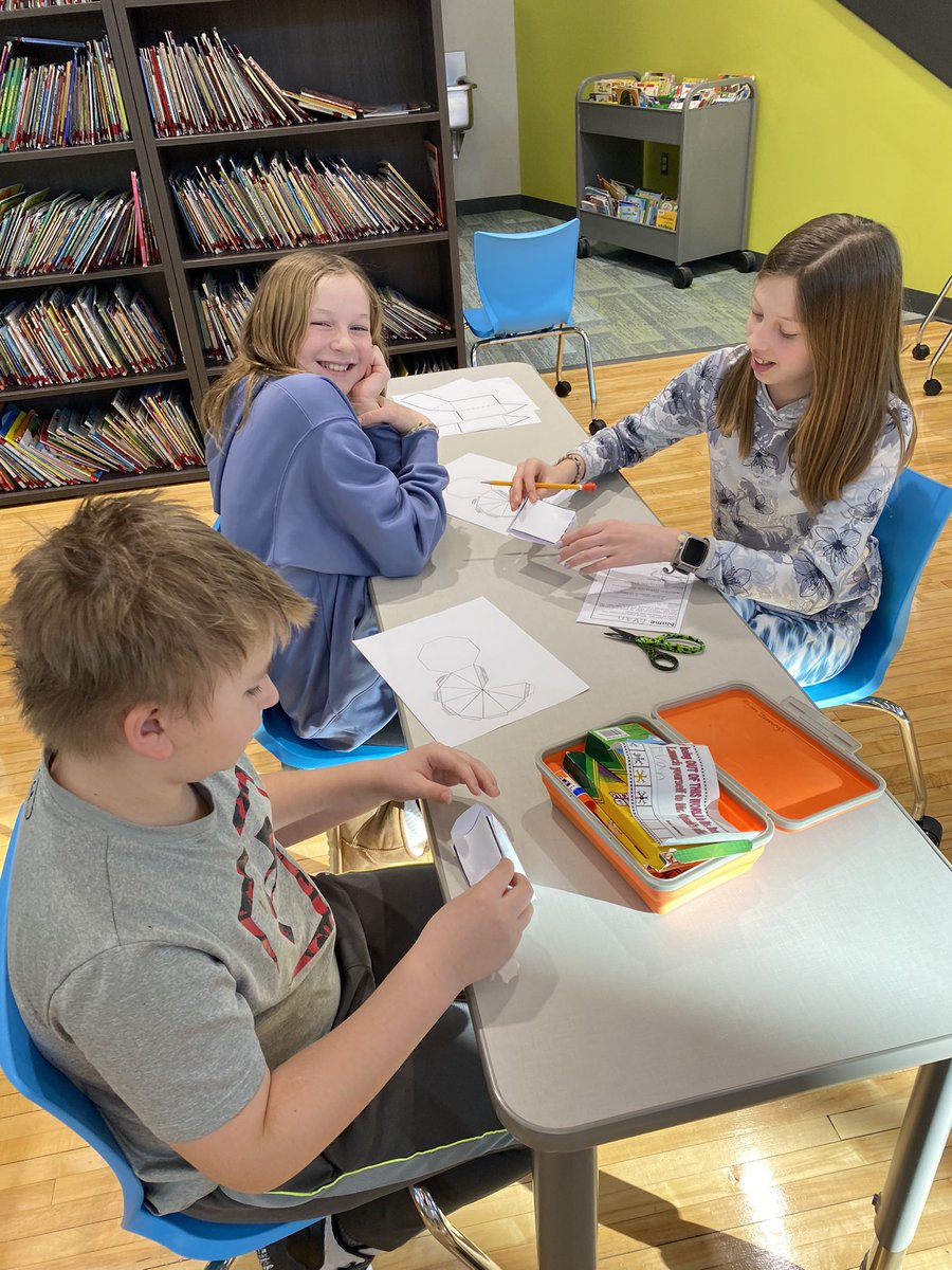 doerhoefer_j's tweet photo. Middle school students mentoring second graders!  Using nets to create 3D shapes.  Love the relationship building! #goodhueschool https://t.co/jUJolThr0s