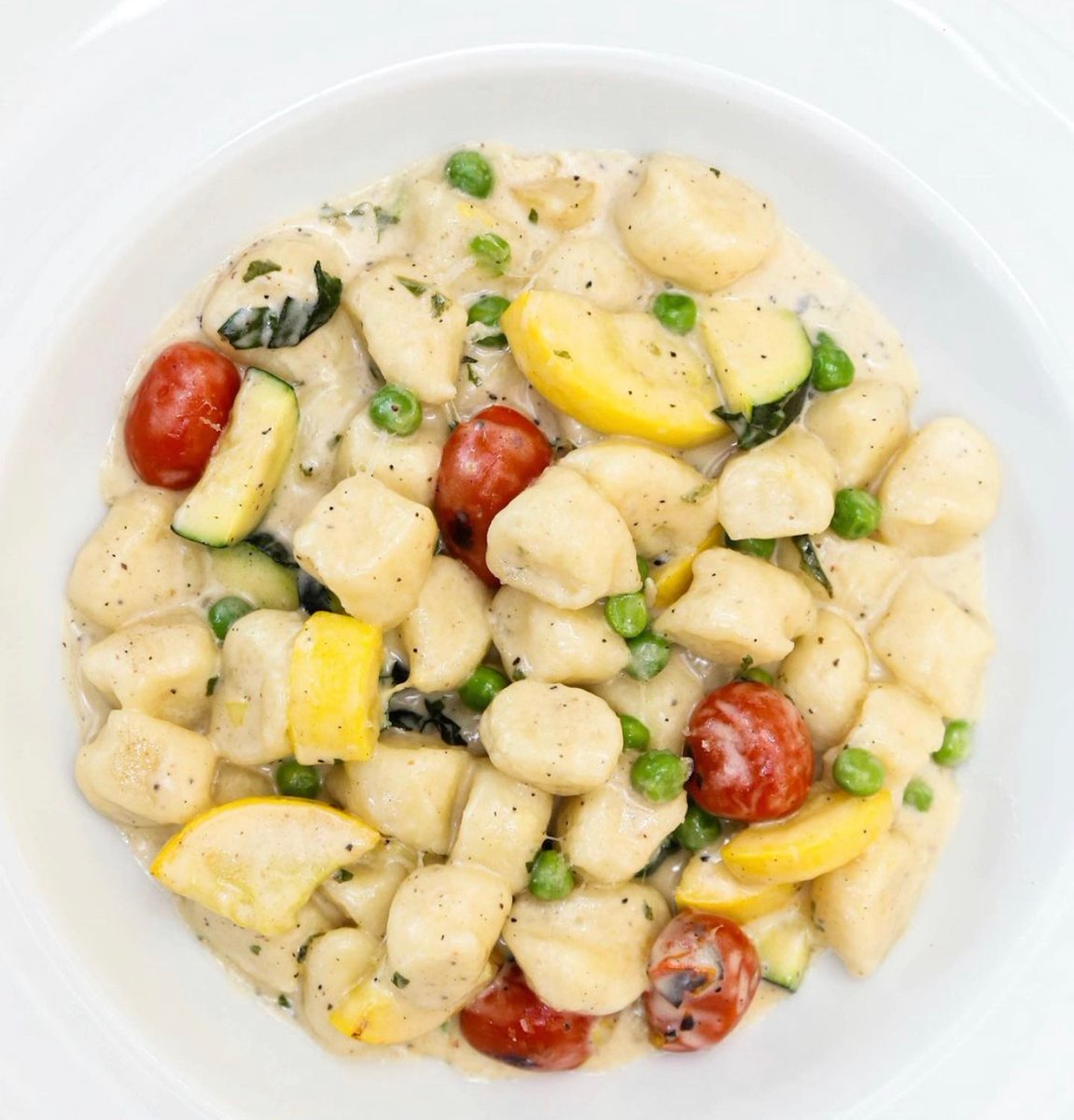 Gnocchi, roasted cherry tomatoes, zucchini, peas, basil, Grana Padano 🌱

.
.
.
📸 <a href="/ilmercatohfx/">il Mercato Trattoria</a>
#HardcoreItalians #italianfood #food #foodporn #instafood #foodie #pasta
