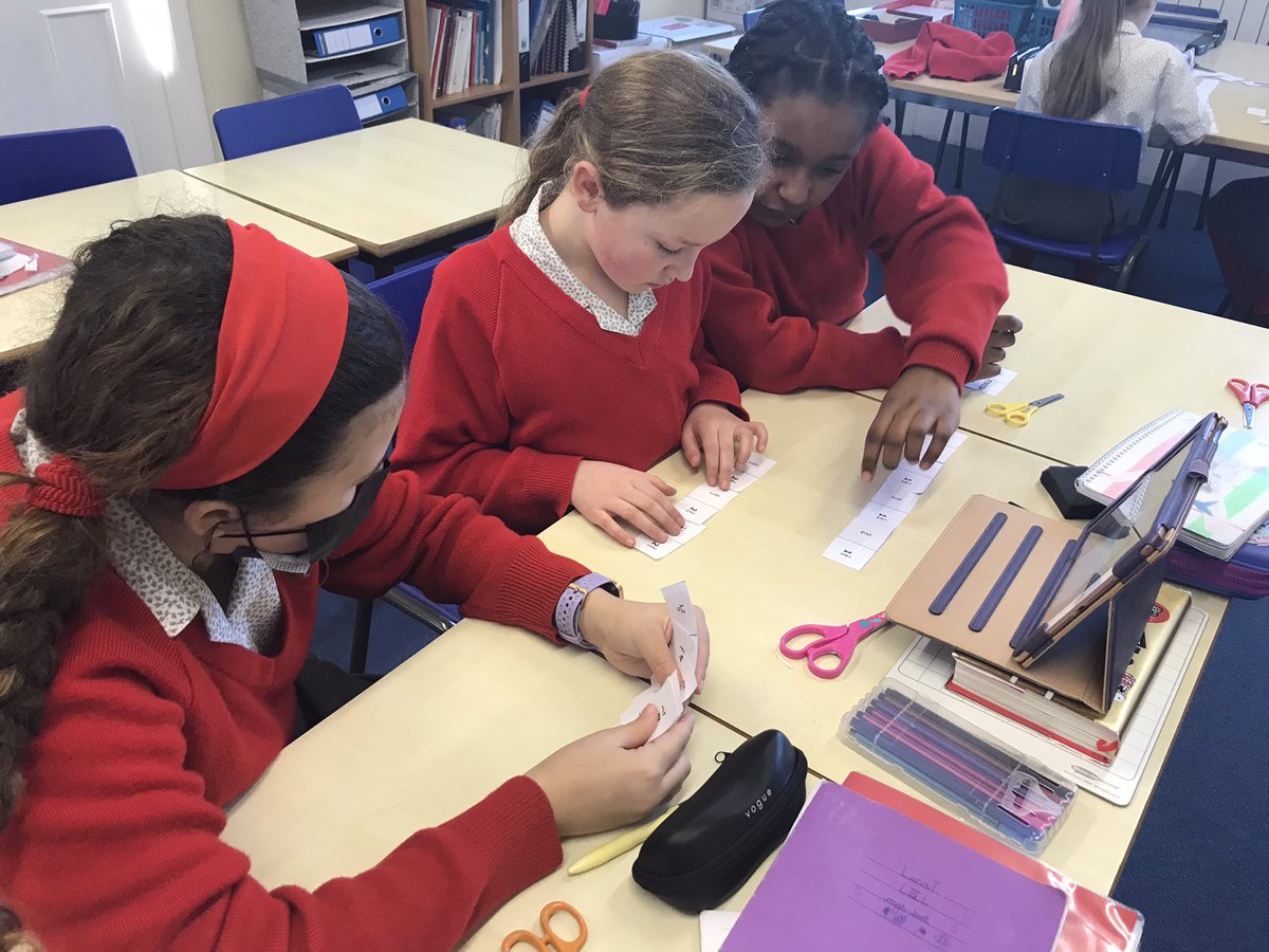 GodstoweMaths's tweet photo. #Year5 are practising converting improper fractions to mixed numbers by making runs of dominoes. Great team work, even including our virtual learners on the iPad. https://t.co/a8T2KZ8vQF