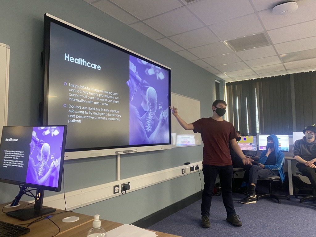 ExeCollBIT's tweet photo. After a session last week using @Microsoft #HoloLens 2 and @htcvive Cosmos the #TLevel group consider the uses of augmented reality and virtual reality now and in the future by producing excellent presentations. Well done all! @ExeterCollege @TechExeter @Pearson_UK @TLevels_govuk https://t.co/xuXxqLLYrb