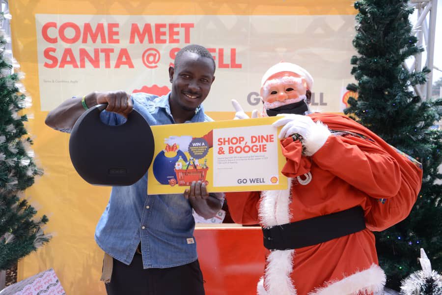 QuteJR's tweet photo. .@Shell_Uganda’s santa is blessing residents of Shell Kitende, 

Shop and boogie from there today! #ShellXmasOffers https://t.co/xmkkzT9AGC