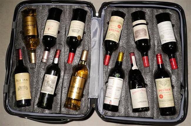 _fiona_green's tweet photo. Just packing for my work meeting.... #suitcaseofwine #BorisJohnsonResign https://t.co/kRcKLjLLYd