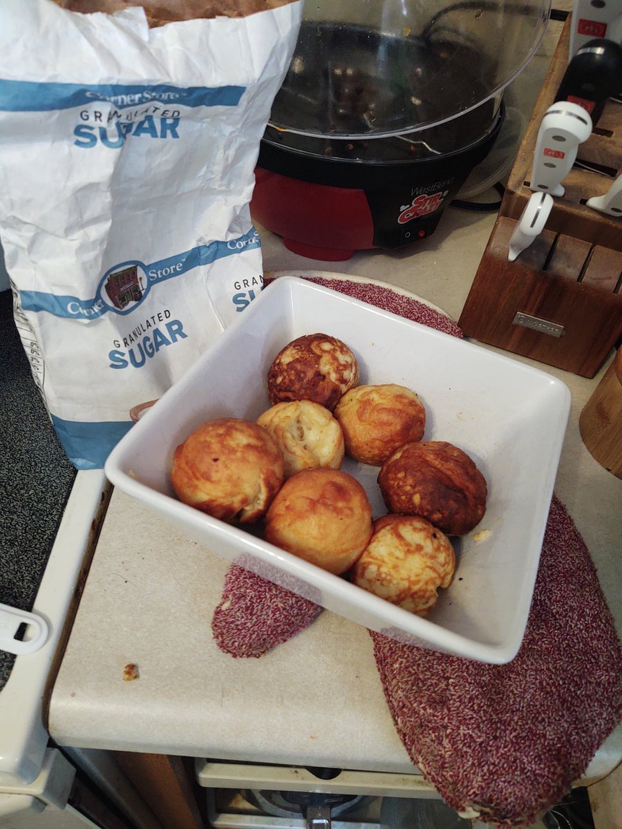 ajrasmussen's tweet photo. Snow day means ableskevers! https://t.co/cFAFmWr0kD