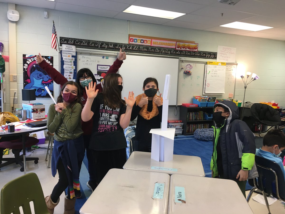 Using teamwork to build paper towers!