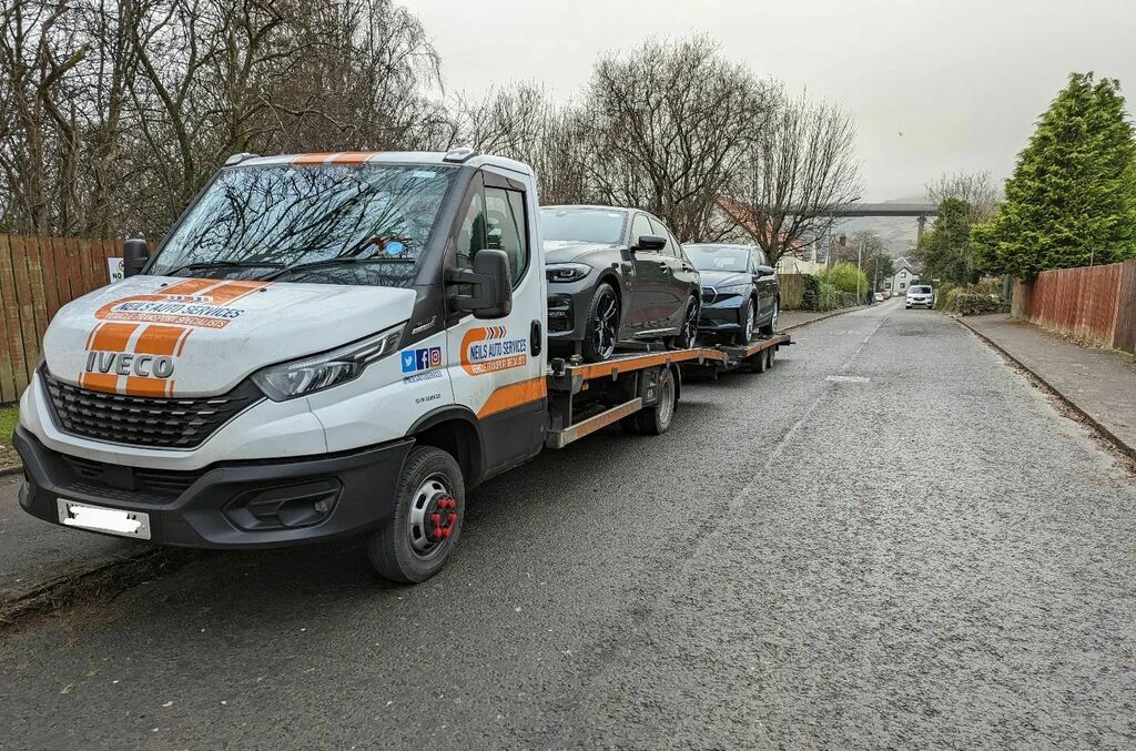 Neilsautoserv's tweet photo. A nice trip up to Scotland to deliver this BMW and Skoda.  You can just make it the Erskine bridge in the background.  Truck is in desperate need of a wash now though. #winter 😀 

#erskinebridge #scotland #bmw #iveco #cartransport https://t.co/jUijW2Ydxz https://t.co/V4HlY4xwb4