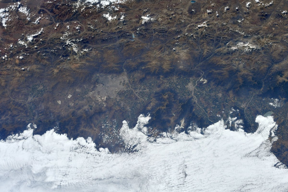 The beautiful cities of Santiago and Rancagua rest against the Andes, with Aconcagua, the highest mountain in the Western and Southern hemispheres and a favorite of climbers from around the world, in the upper left of this view.