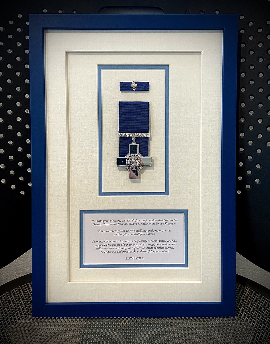 neframing's tweet photo. It was an honour to frame this George Cross that has been awarded to the National Health Service of the United Kingdom by Her Majesty The Queen. 
It's in recognition of all NHS staff, past and present, across all disciplines and all four nations. https://t.co/jQMHMUeOWi