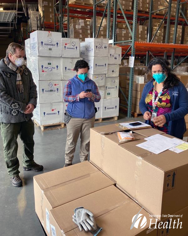 WADeptHealth's tweet photo. Hurray! A shipment of new COVID-19 tests arrived today in Olympia and DOH staff jumped into action - and vans - to get them delivered to schools across Washington. #COVID19 #COVID #supportpublichealth https://t.co/xAqJ26Uz6t