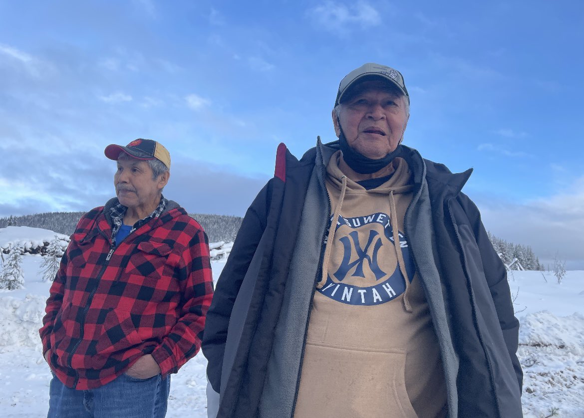 Wet’suewet’en Hereditary Chief Madeek sees where CGL is planning to lay its pipeline &amp; drill under the sacred Wedzin Kwa River for the first-time this afternoon. It’s like his expression carries the collective sorrow of so many. Chief Gisday’wa looks on in the other photo.