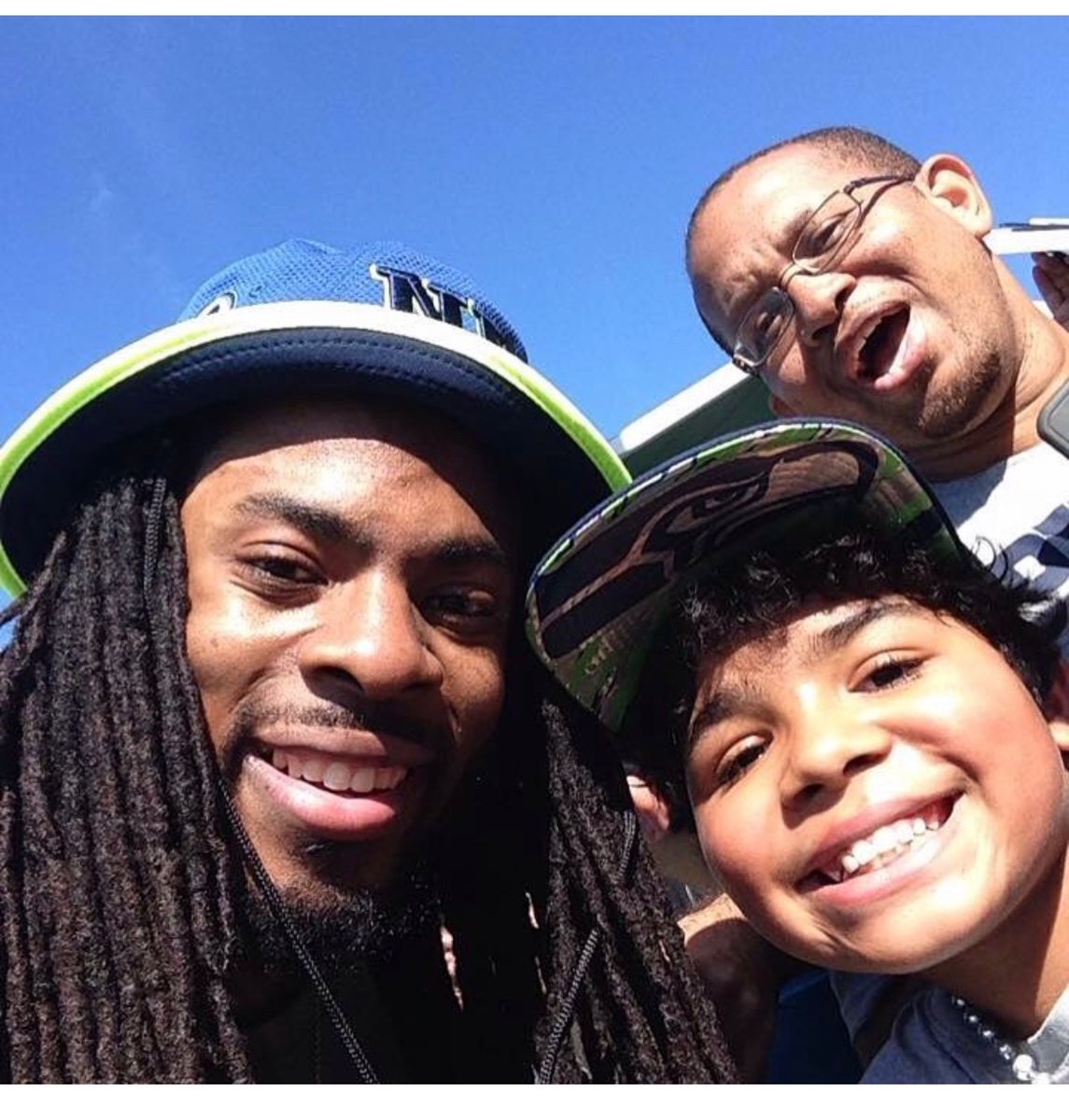 Timitayou's tweet photo. @RSherman_25 @RSherman_25 Its so hard for me to find size 12 football cleats for my son! I would love to get some from you for him! 🙏🏼 he’s always been a fan of yours-picture from five years ago! https://t.co/nkjOlBSGA6