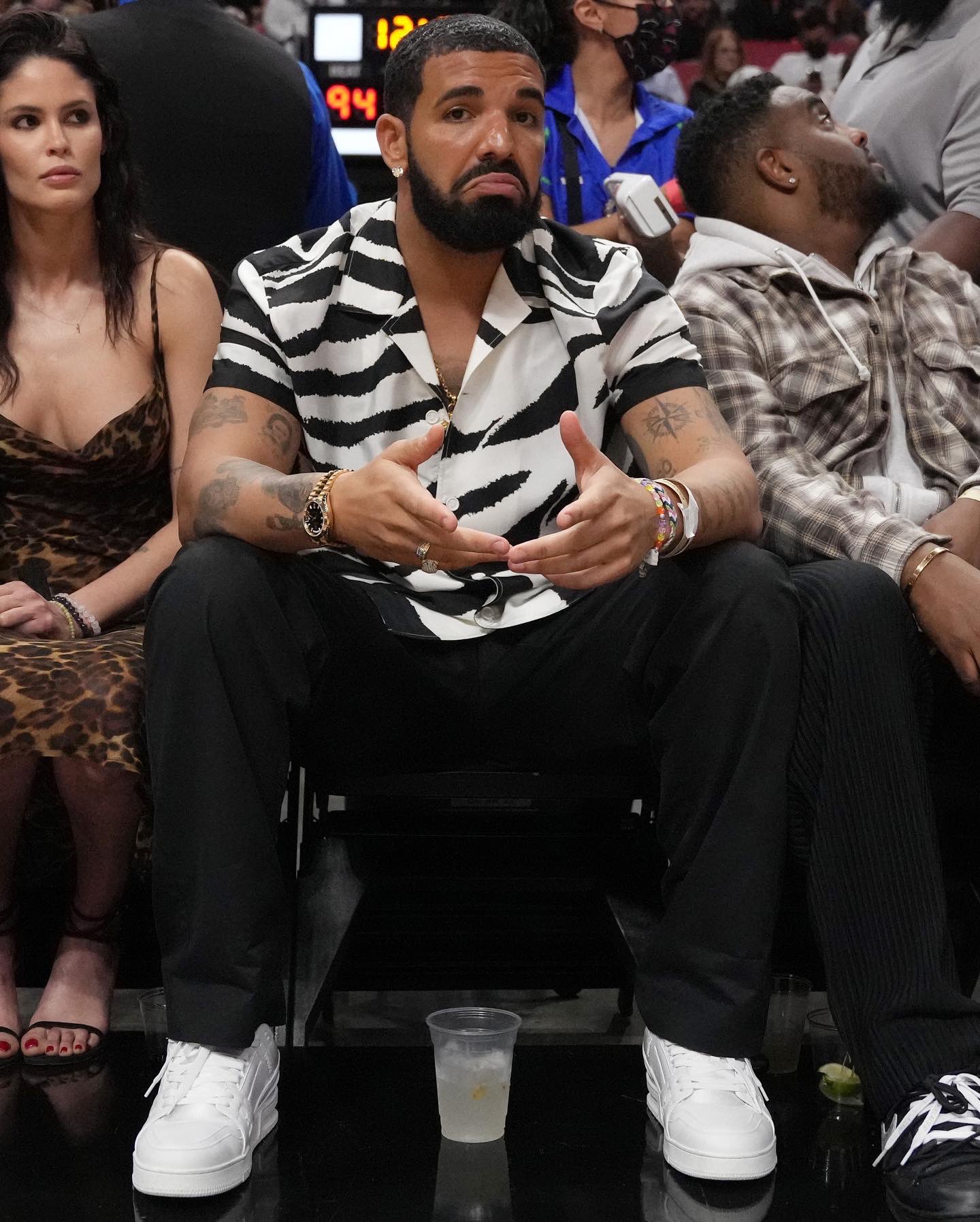 Complex Sneakers on X: Drake wearing Louis Vuitton Trainers courtside in  Miami 🌴  / X