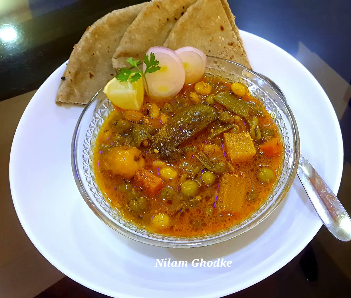 nilam_ghodke's tweet image. Thank you @Ramdev_Food for this awesome contest. Here, is my entry dish Healthy wholesome vegetable casserole "Undhiyu" with "Bajra roti" #lapetwithramdev