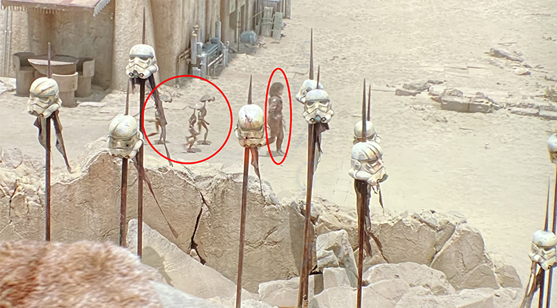 SWSocEntSWAG77's tweet photo. Did anyone else see this in the red circles? Took me 3 times of watching #TheBookOfBobaFett Chapter 3 &amp; my first time seeing the background. 🤣

#StarWars #BookOfBobaFett #Chapter3 #PeliMotto #DumDumDroids #MosEisley #BobaFett #PykeSyndicate #Tusken #Sandpeople #Bantha #Jawas https://t.co/ECXKnbplCN