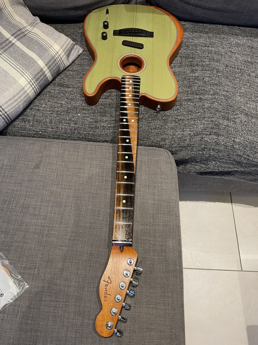 Time for an overdue string change and a good application of lemon oil. The fretboard is beautiful, a lovely guitar to play too.