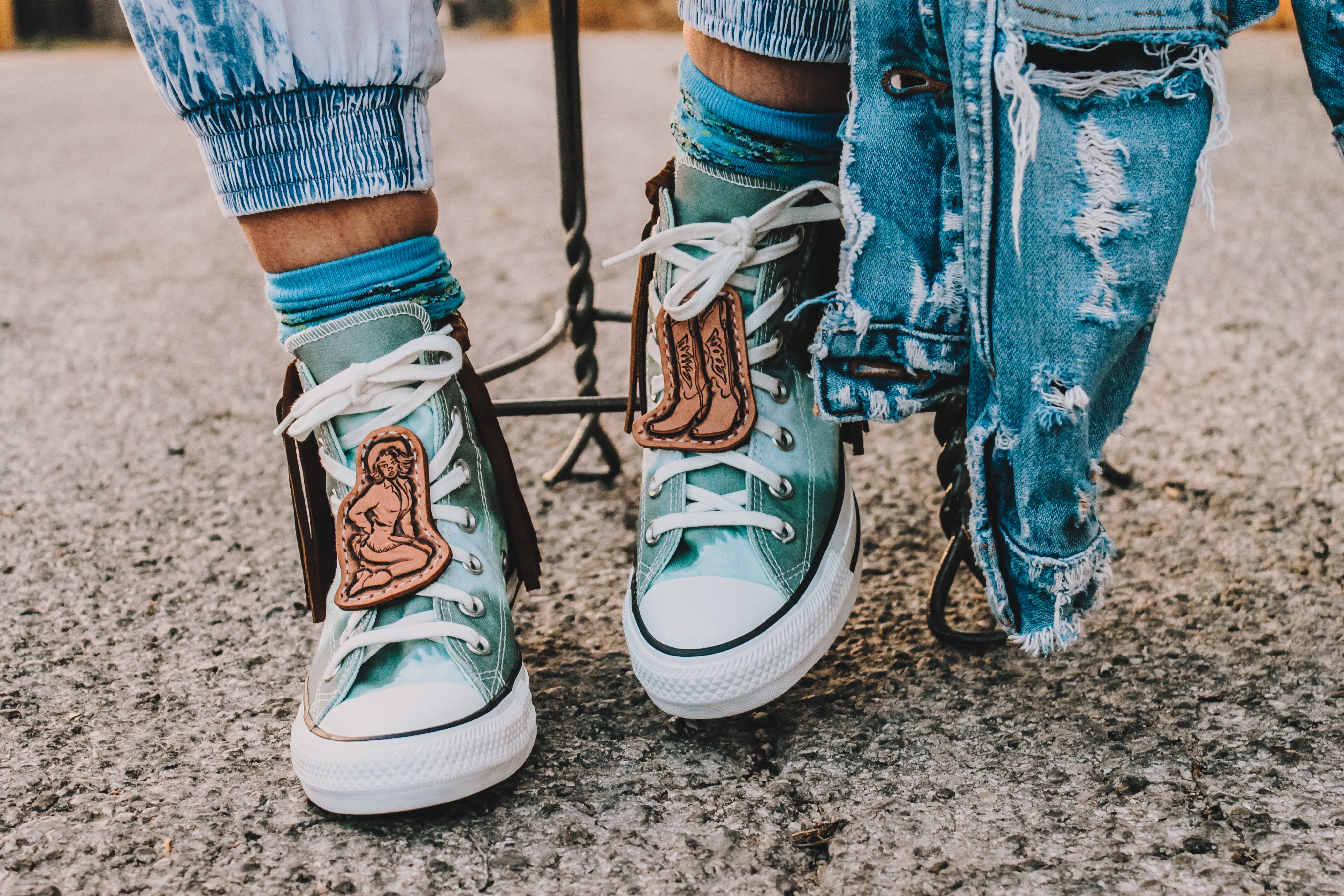 Tooled store leather converse