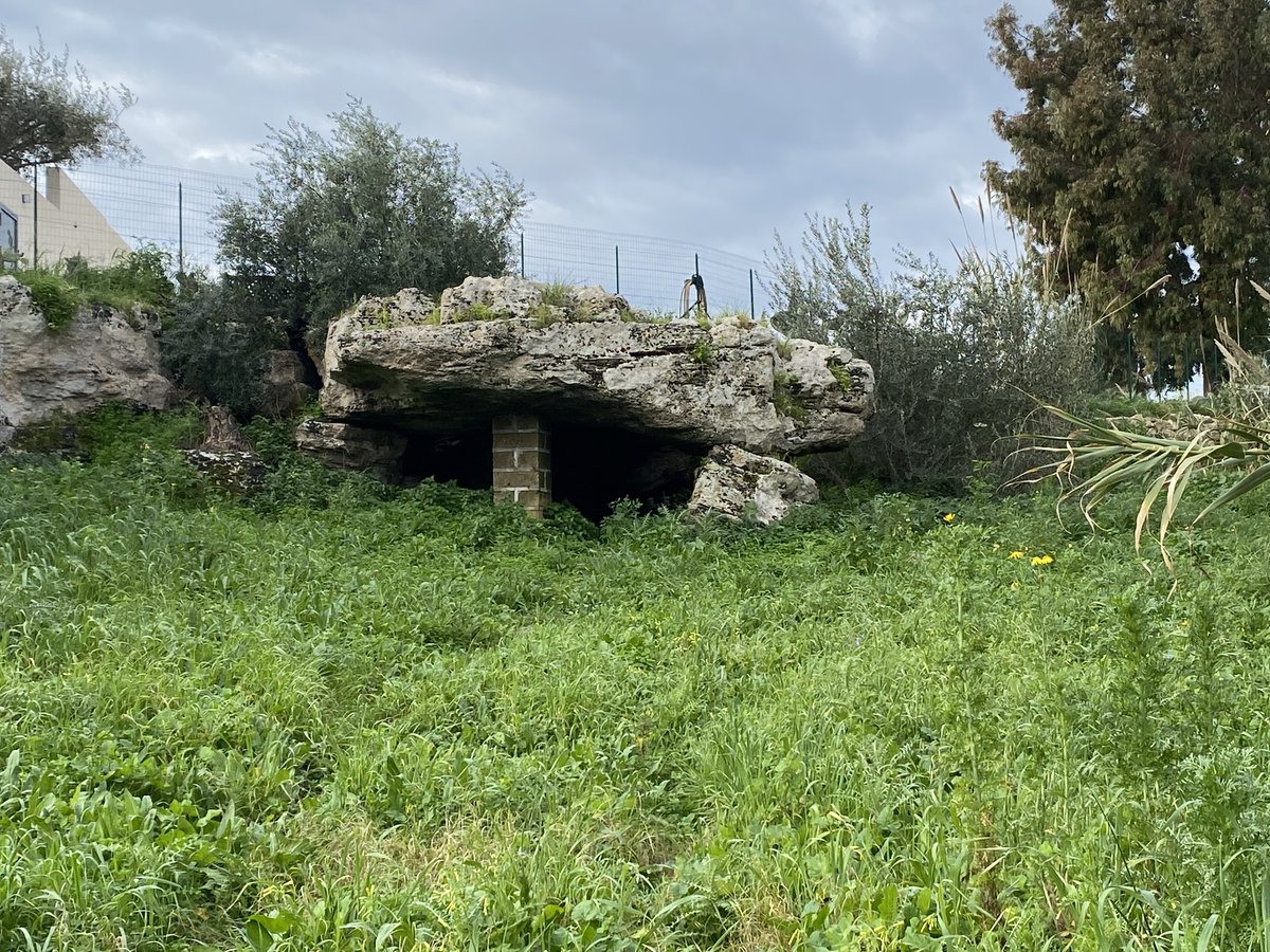 The dolmen of Avola sits on the edge of a small valley called the Cava L’Unica. It's almost eight metres in length and five and a half metres in width. It's considered to be pseudo-dolmen because it might be a natural formation.