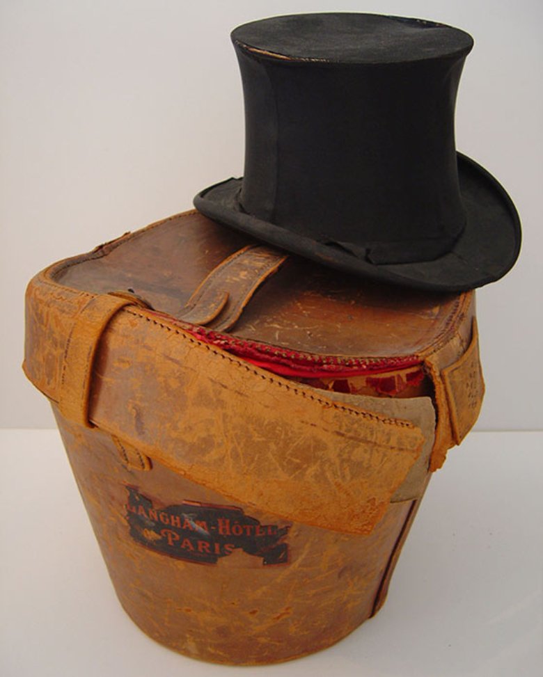 PresBenHarrison's tweet photo. It's #NationalHatDay! ๐ฉ The 23rd president's top hat became an iconic symbol of his campaign and administration, and can be found in many political cartoons and paraphernalia of that era. The leather hat case has labels or stickers from Harrison's trip abroad in 1899. #potus23 https://t.co/B6XX7ENUIj