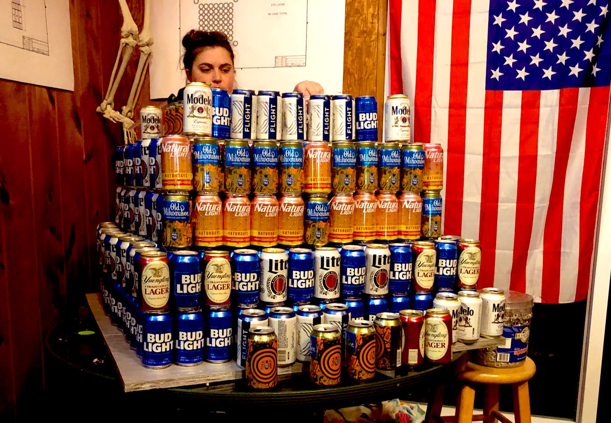 Our engineer, <a href="/007shellbee700/">Shelby Armstrong</a>, doing work piecing all these empties together into a shrine to the beer gods 

BeerForCharity.com | #Dusick800