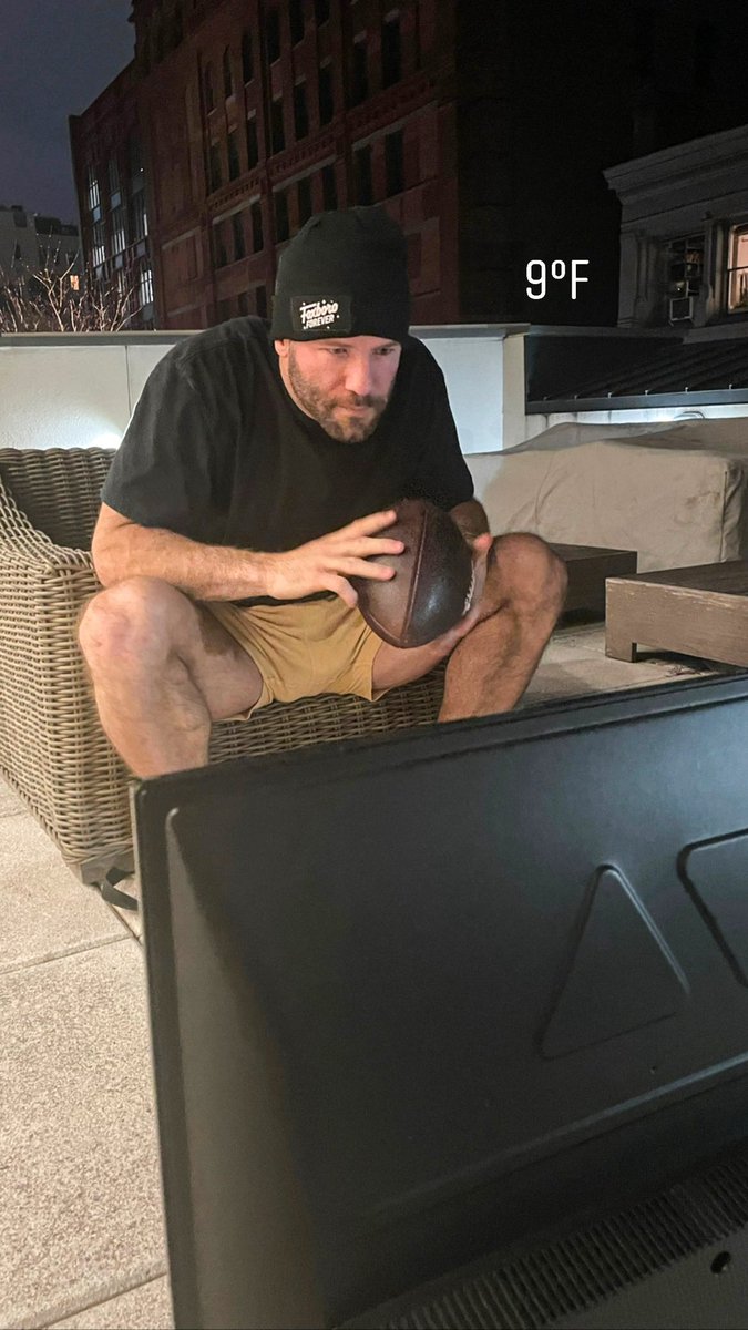 Edelman11's tweet image. Riding out the elements with my guys #PatsBills