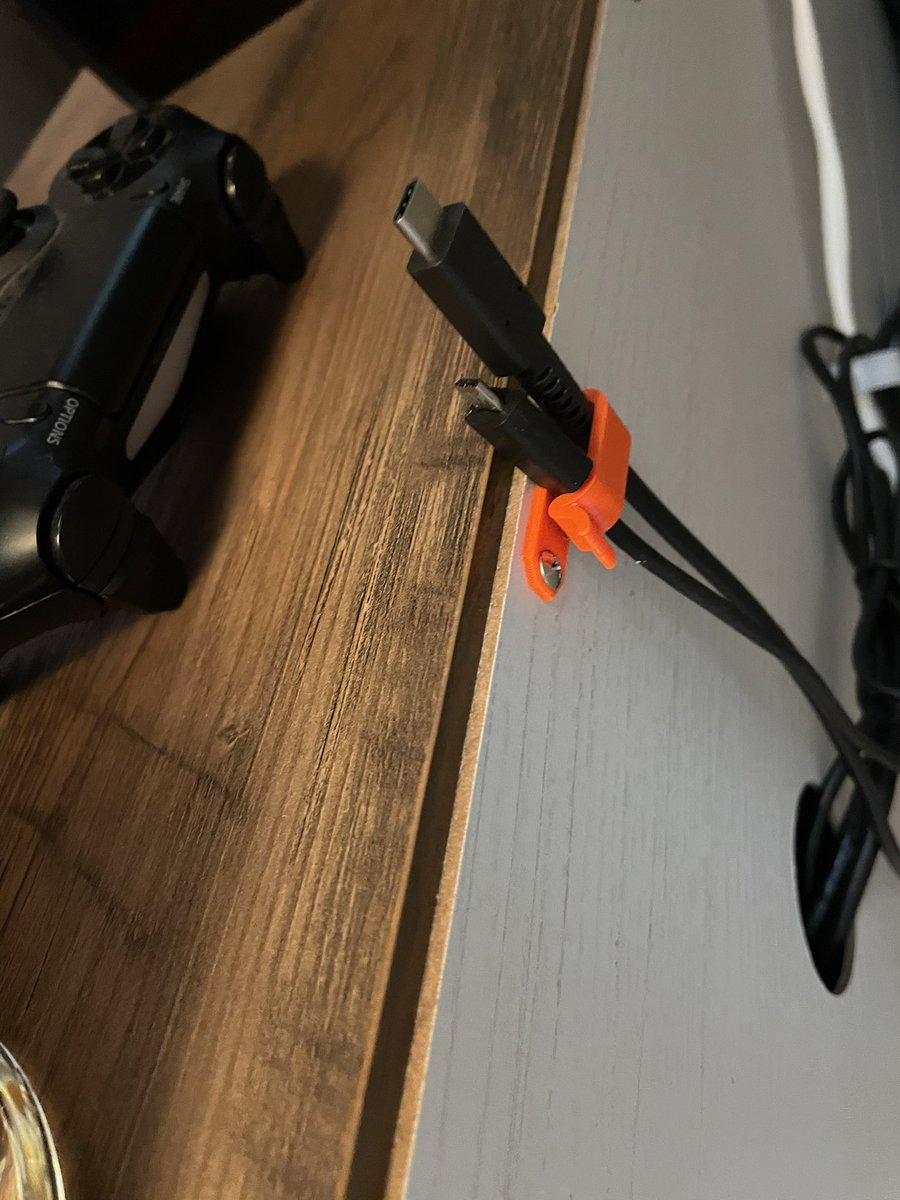 computingond's tweet image. Benefits of a 3D printer, quick and easy to design and print a clip to keep cables from falling behind entertainment center. I’ve got a bunch of extras if anyone needs.