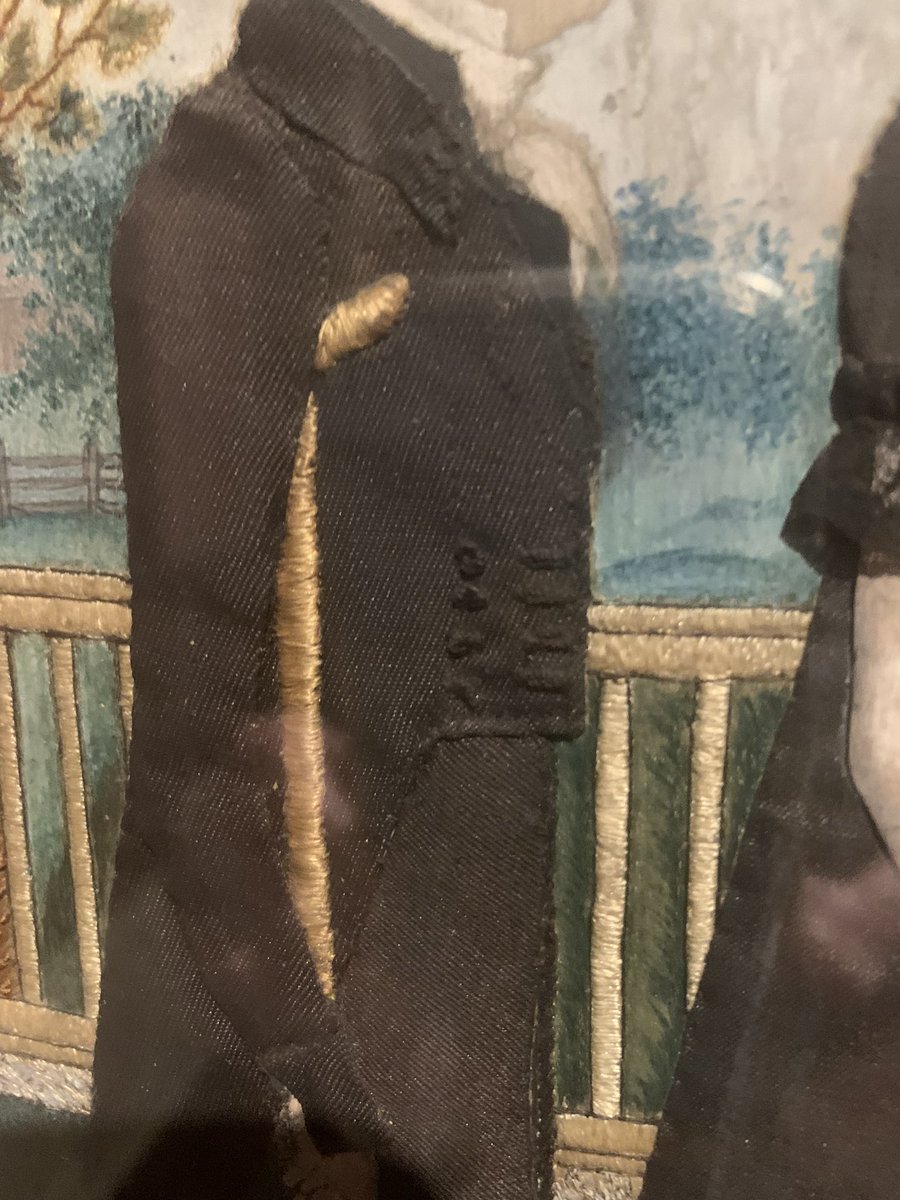 Mourning needlework with dress details in appliquéd fabric. Lucretia Carew, daughter of Lucy Carew who had a school in Norwich CT. In honor of sister who died in childbirth 1800 &baby died soon after). Note apparent brother on crutches! Disabilities are seldom portrayed.