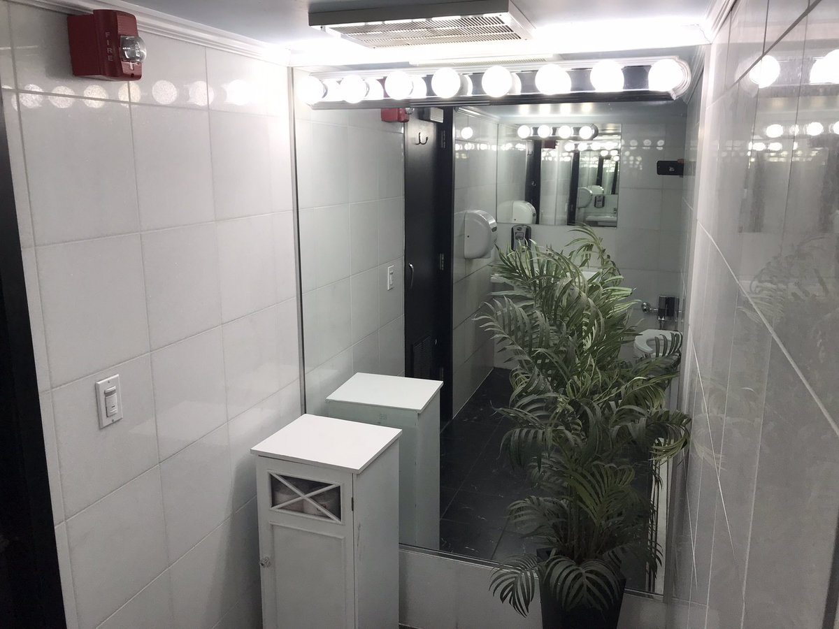 Unisex bathroom <a href="/MariosTable/">Mario's Table</a> in Chicago. + 0 for unisex. Not sure? + 3 for the massive plant. -2 for the toilet paper on the floor. -1 for the 1990’s hand dryer. Overall 4/5 because it’s private and they have a lock. Gr8 restaurant too.