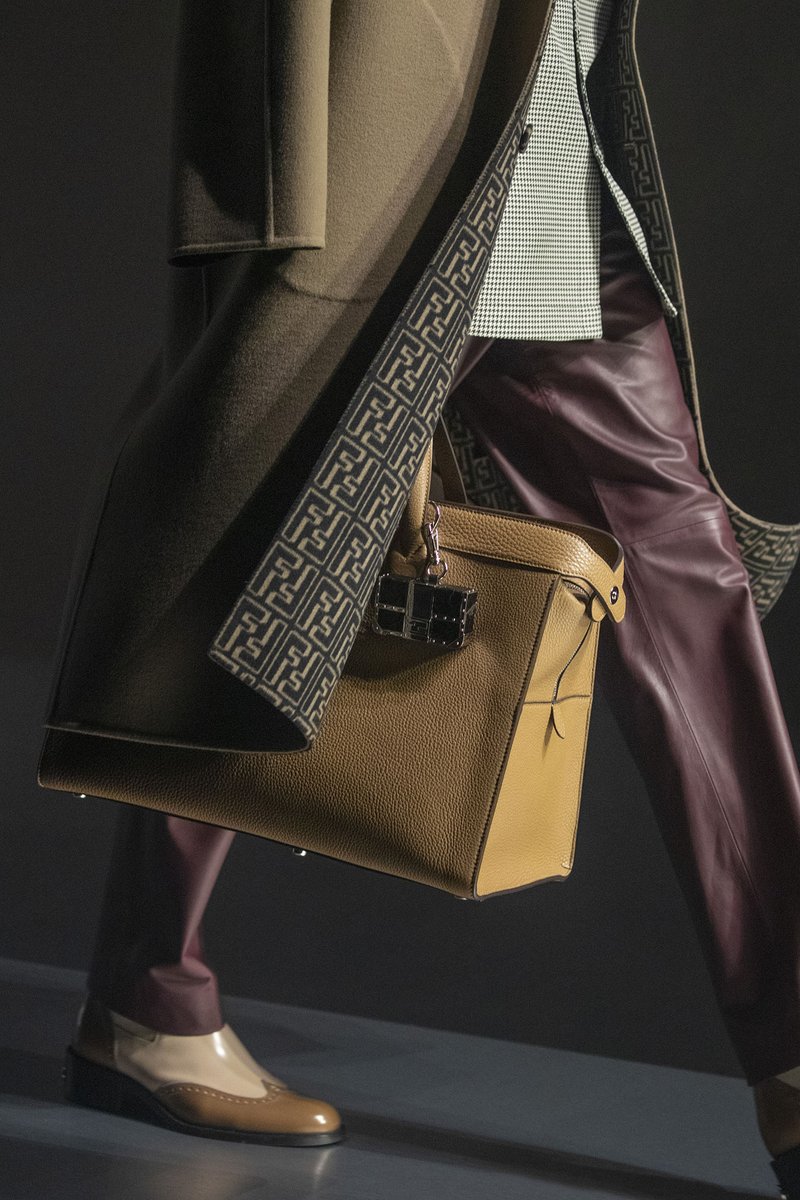 Fendi's tweet photo. Craftsmanship meets innovation in the #FendiXLedger collection of tech accessories for the @Ledger Nano X hardware wallet – designed by #SilviaVenturiniFendi and presented as part of the #FendiFW22 men’s runway show. https://t.co/05Zlfzyg3O