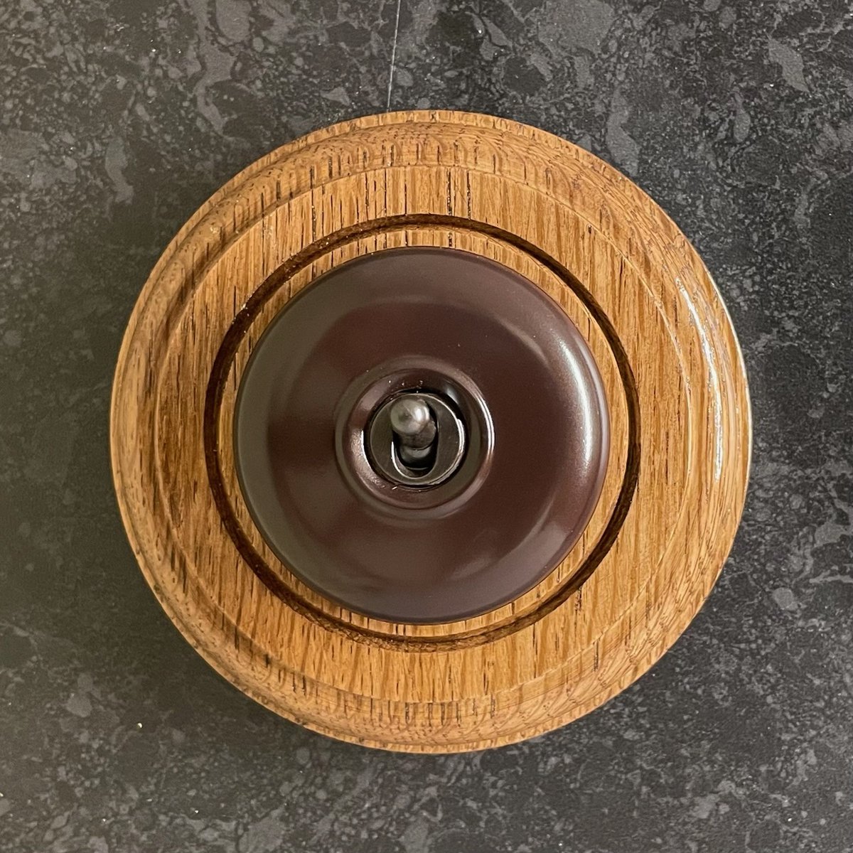 At last our new version Bakelite switch: The Clipsal plastic dolly switch has been superseded by a beautiful brown domed switch with a high quality Wandsworth bronze toggle.We believe that this is a superior quality built to last and aesthetically
close to the old design