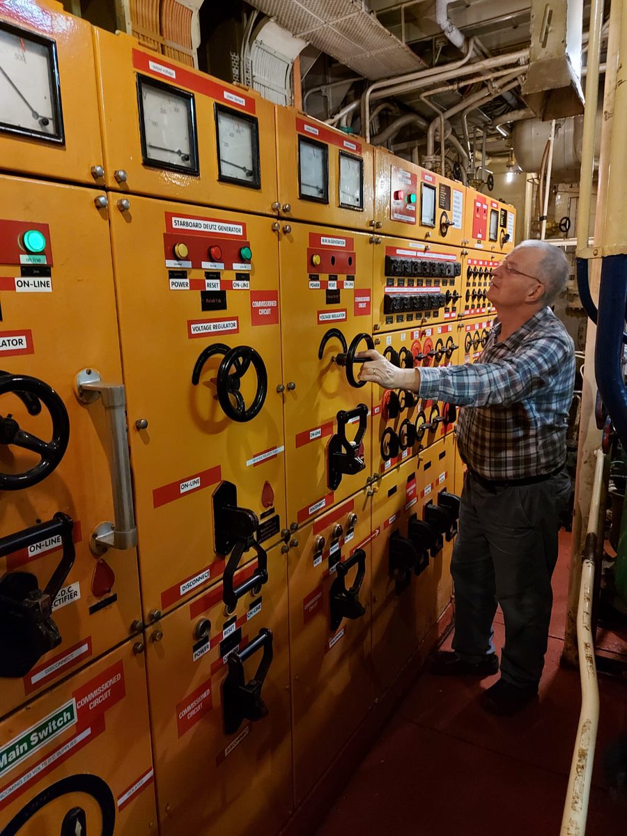 TheRadCaroline's tweet photo. Johnny Lewis live from Ross Revenge at 9am this Sunday morning on Radio Caroline North. Here he is with the ship’s engine room DC power controls. On 648 AM, on 1368 AM in the N/NW via @manxradio , worldwide online at https://t.co/uOV6jEM0uI , on smart speakers and on the app https://t.co/syvqsskFRk
