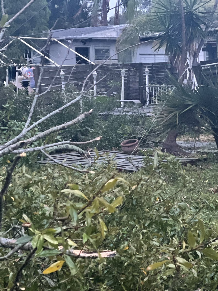 Lorry_Brutcher's tweet photo. @DenisPhillipsWx Think a tornado came through St Pete. Trees, fences, sheds down. Lost power - don’t know what lines are down but they’re all mangled in my yard with the tree limbs. https://t.co/axP3kM1HwV