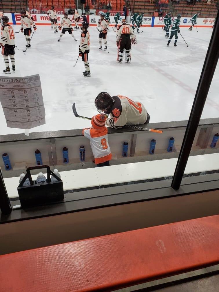 Spraw_Heather's tweet photo. As Blake says “this was the best night ever”.He was kid coach of the BGSU hockey game! What an experience “Score a lot of goals,get alot of saves and sign jerseys”was Blakes advice to Coach @TyEigner  on what they need to do to win! @BGFalconHockey and all of the players rock! https://t.co/EcbB22ILDi