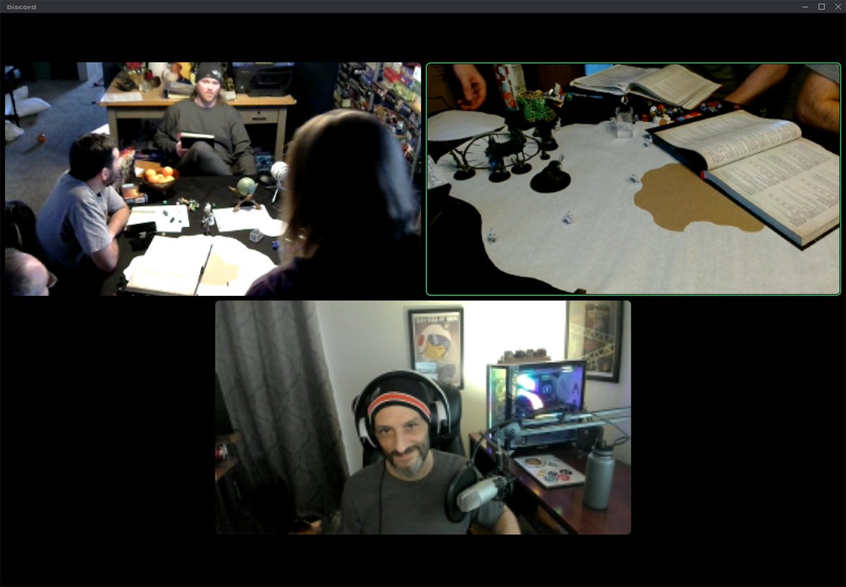 theweem's tweet photo. Playing some #dnd today - our long-running campaign (few years now) and facing a potential TPK ;) I moved out of the area, so I join them all via discord (I'm on the bottom camera there). There is a cam on the table/fight, and one up high looking at everyone ;) #rpg #discord https://t.co/U89GfJPePr