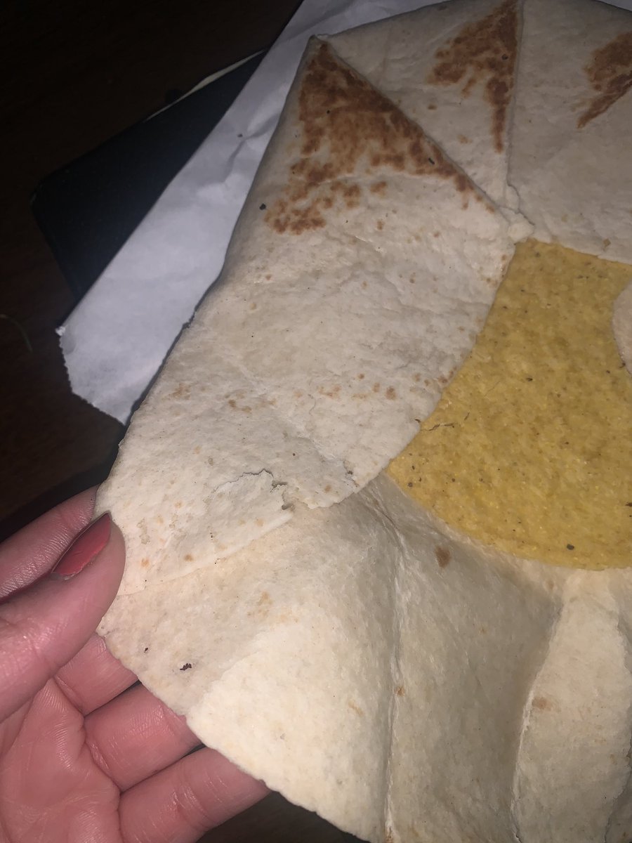 karchermo's tweet photo. I just ordered @tacobell from @Postmates for the first time and they delivered four empty tortillas ??? this is an all time low for me 😔 https://t.co/lJLcTCWxmb