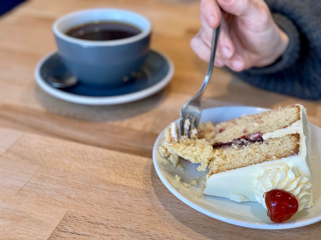A slice of cake a day keeps the January blues away. 🍰🙌      

Monday - Thursday from 2:30 to 4 we run a cheeky little cake deal. Any coffee and any cake for £4.95! 

Pictured here is our new Bakewell cake from Sugar Society Cakes and coffee brewed and roasted by us 🐻