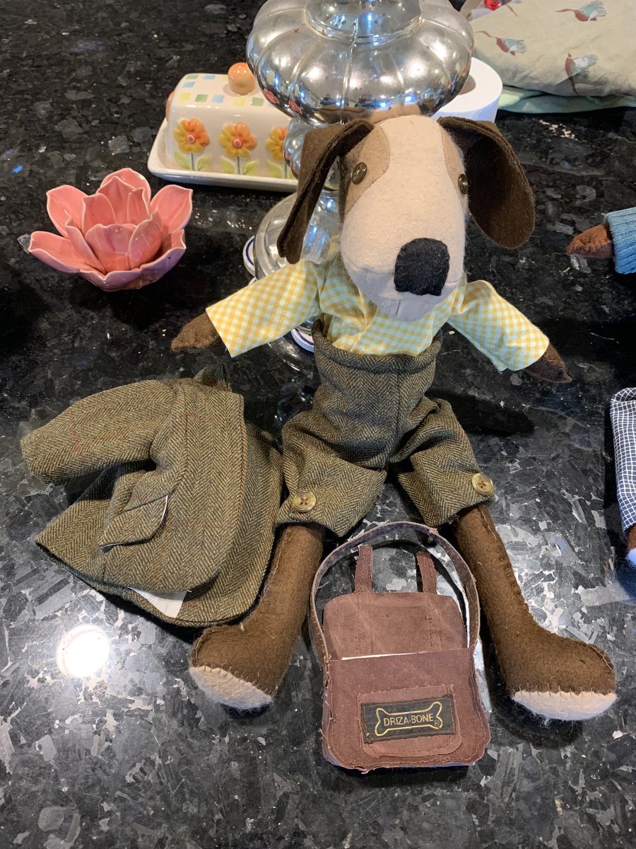 paulinedaniels's tweet photo. Badger is having a outfit fitting.! I’ve been asked to make some clothes out of a friends fathers clothes.. He’s beginning to look very smart.! Boots and buttons next.!!  #drizabone #feltanimals #preloved #dogs https://t.co/GpTjZo2tze
