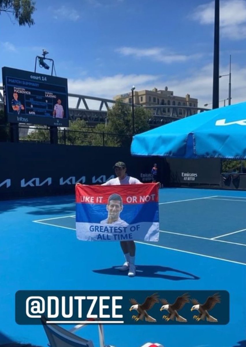 TisicSacha's tweet photo. Avant son match contre Martin Fucsovics au premier tour de #AO2022, Dušan Lajović a manifesté son soutien envers Novak Đoković. Ça lui a porté chance : victoire 3 sets à 2. https://t.co/EH1MT57GQi