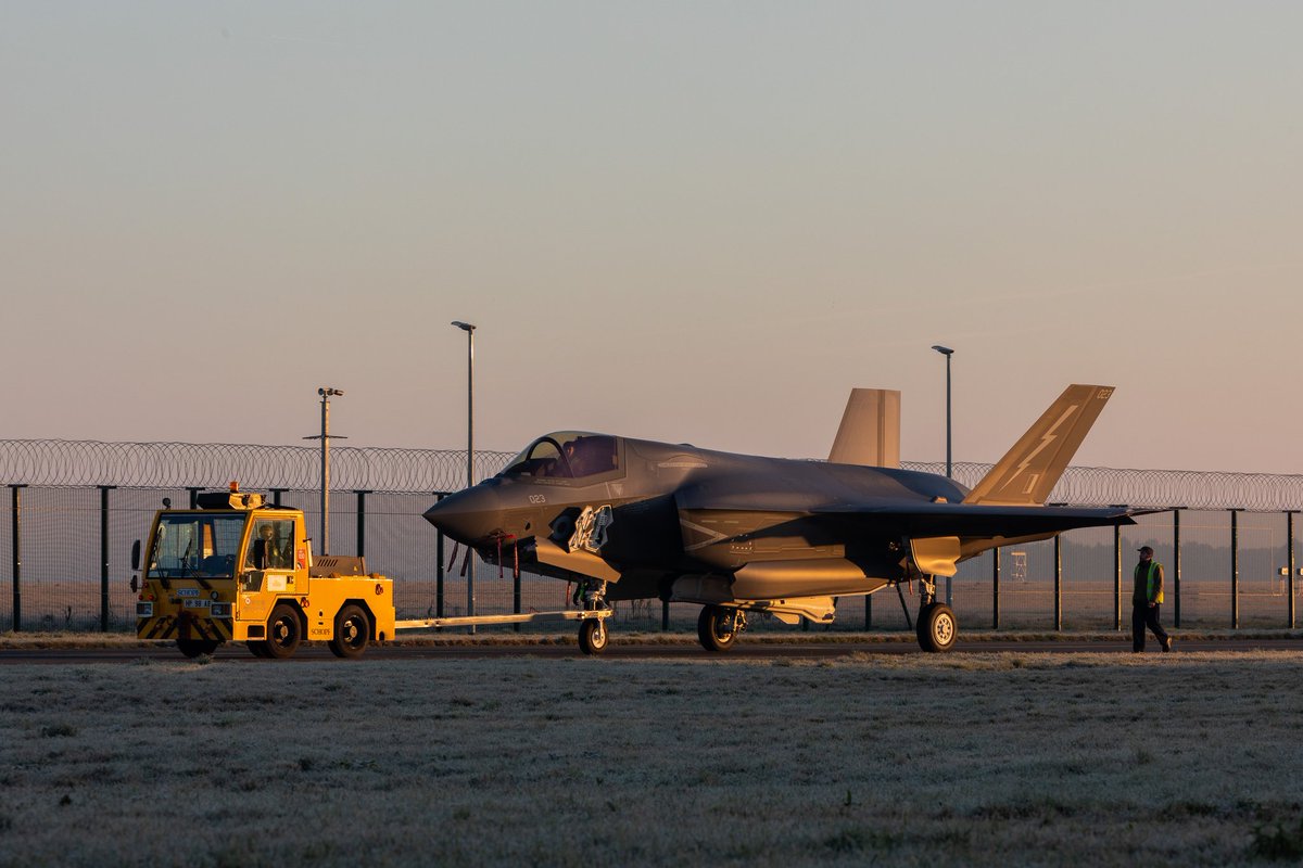 RAF_Marham's tweet photo. A stunning sunrise at @OC207Sqn last week, not unlike what we have here again this morning.

207 Squadron groundcrew can be seen here towing the aircraft from the hangar to the sun shelters ready for the flying programme.

Brilliant imagery from SAC Williams &amp; SAC Adams. https://t.co/3dzXbwvqfl