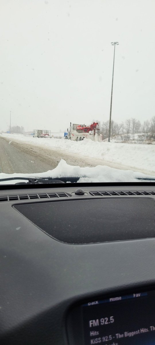 WxMelinda21's tweet photo. Almost 1.5 hour drive into work. The #401 is closed and yes those cars and trucks are just stuck sitting there in the snow #410 #ONSnow #ONStorm #gtasnow #gta #onwx https://t.co/uGP8qrAlHs