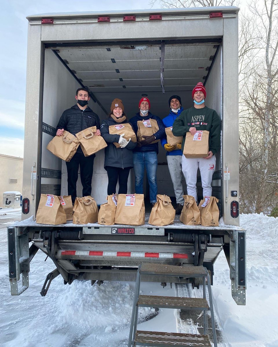 DenisonSwimDive's tweet photo. Rough weather doesn’t stop the fight to end hunger. We love partnering with Feed The Dream every year collecting donations and filling the truck with food to help Licking County Food Pantry. https://t.co/LXBnvb7Hfg