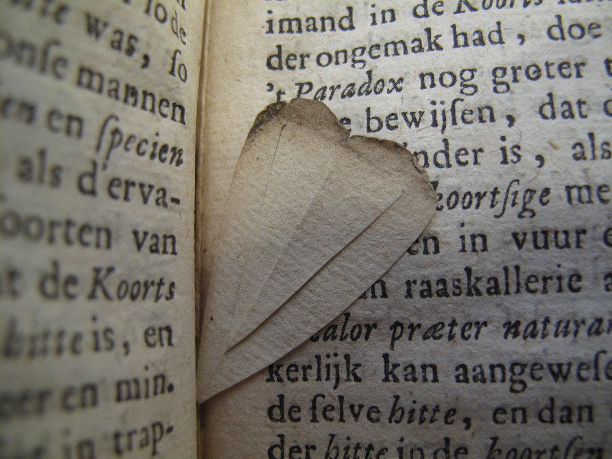 MarshsLibrary's tweet photo. A heart bookmark found inside a collection of Dutch pamphlets from the 1680s. Amazing that something so delicate managed to survive! #rarebooks #bookmarks https://t.co/px1Q8AJPYr