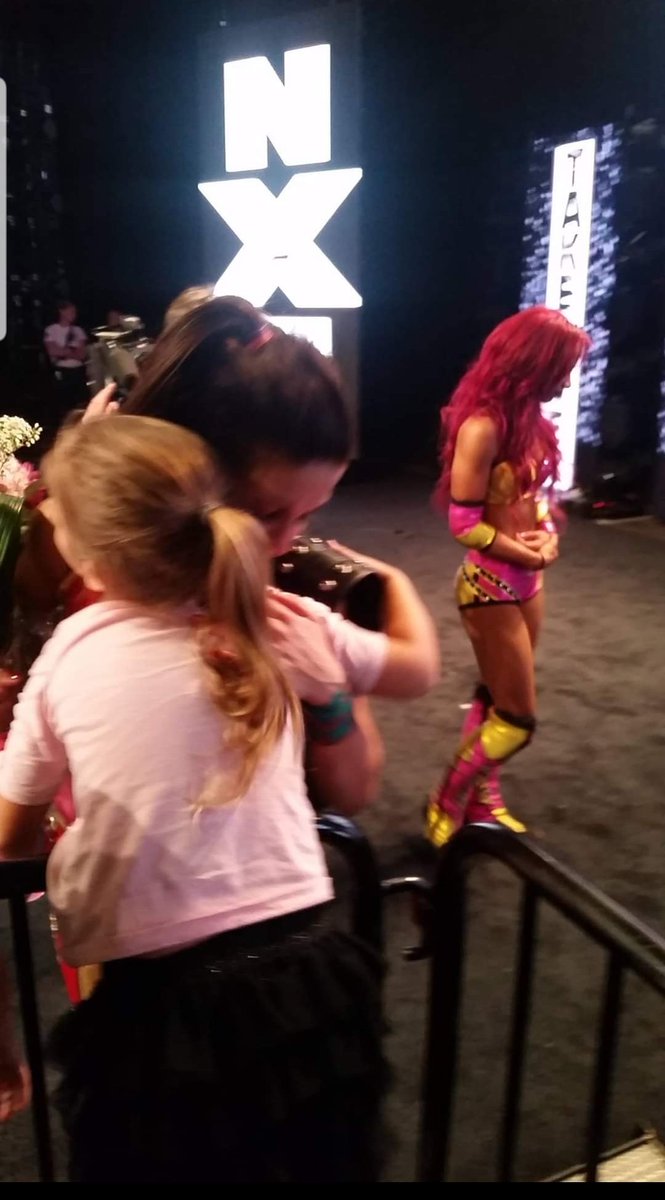 thepromopete's tweet photo. @FiteTV @WWENXT #takeoverRespect After @itsBayleyWWE beat @SashaBanksWWE. Our favorite wrestling moment ever. 

She was always so wonderful to my daughter Emma. Cant wait to see her back. https://t.co/35EDX1GX3v